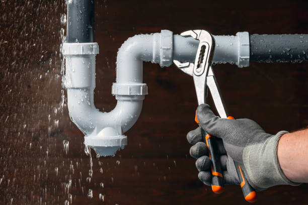Professional Plumbing technician working in Russellville, AL